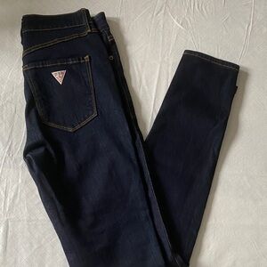 Guess Dark Indigo “1981 Skinny” Jeans with Signature Triangle Patch